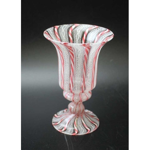 286 - A Venetian latticino flared rim goblet, 13.5cm high, together with a 19th century cordial glass, hav... 