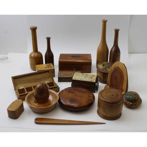 379 - A collection of Treen, includes lidded boxes, money box, turned vases etc