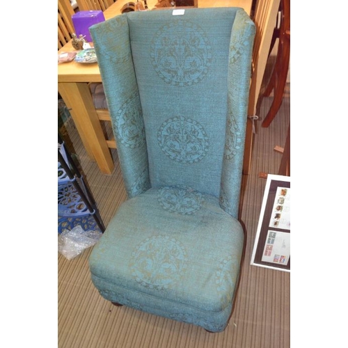 422 - A turquoise upholstered high back chair