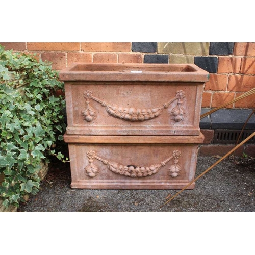 436 - A pair of terracotta trough planters