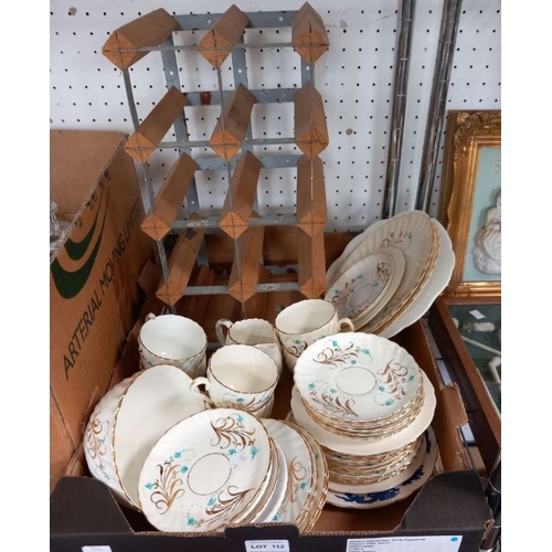 5 - A box of decorative china with a small wine rack