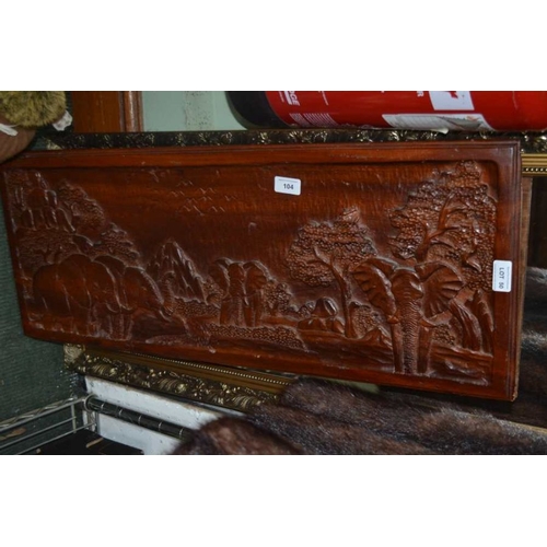 50 - A gilt framed robing mirror together with a carved wooden panel depicting elephants