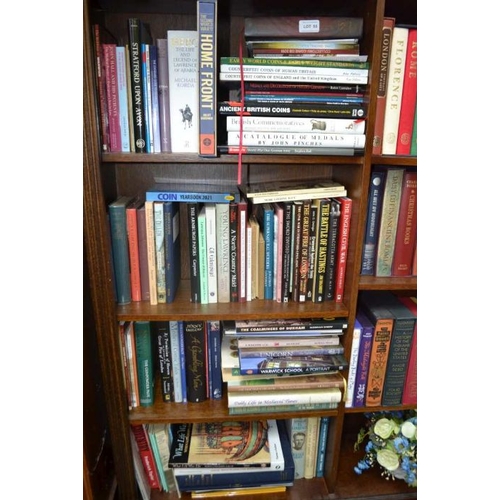 55 - Five shelves of predominantly hardback books on a wide variety of subjects