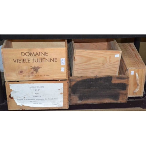 153 - An assortment of seven wine crates / storage boxes