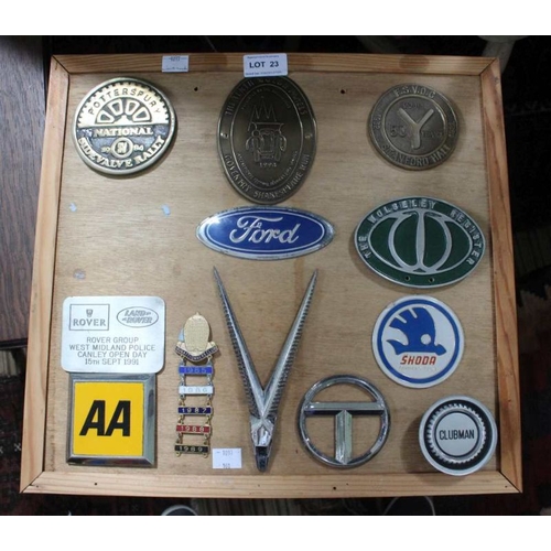 23 - A presentation board mounted with metal car manufacturer badges, includes a Bugatti Owners Club memb... 