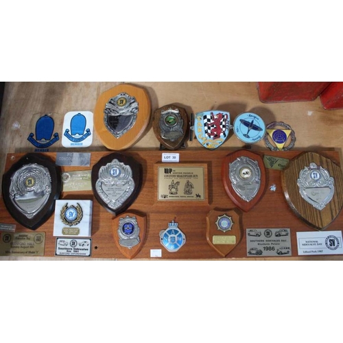 30 - A selection of car show trophy's mounted on board, with five other loose examples