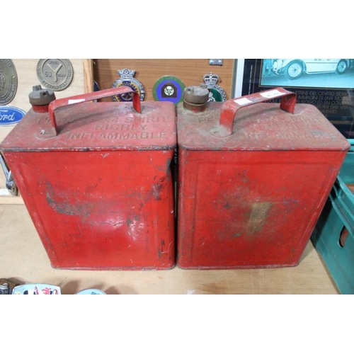 32 - Two red vintage fuel cans with brass tops