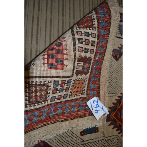 101 - A Persian runner, cream ground with three lozenge patterns in red, blue and green, fringed and borde... 