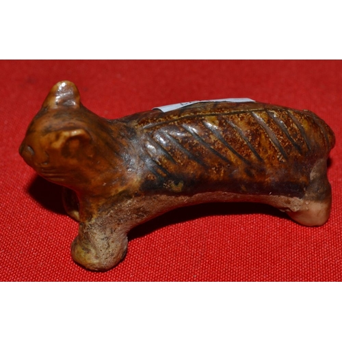 11 - A South-East Asian pottery cat mottled brown glaze 7.5 cm long