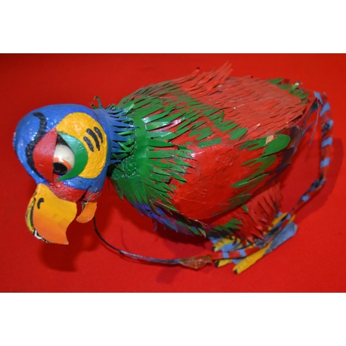 6 - A painted model of an exotic bird 24 cm high