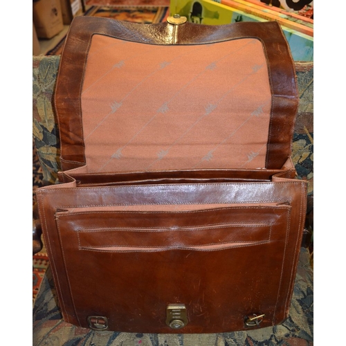 92 - A brown leather briefcase branded 