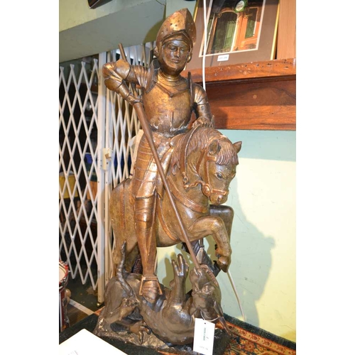 18 - A 16th century wood carving 'St George & the Dragon', poly-chrome painted & partial gilt.  St George... 