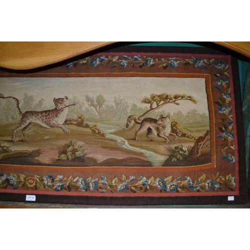 93 - A 17th Century French tapestry panel depicting a pair of hounds to the left chasing a central leopar... 