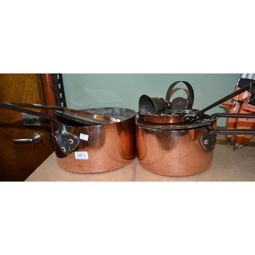 1 - Copper saucepans various, the largest 14cm high,  27.5cm diameter, and a small brass bell