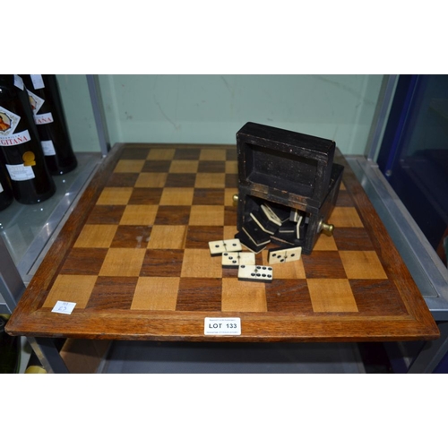 133 - Vintage wooden chess board and old bone dominoes in a box