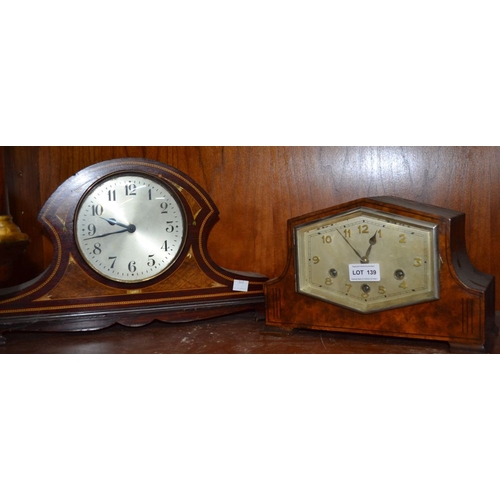 139 - A fancy inlaid mantel clock, together with another Art Deco example