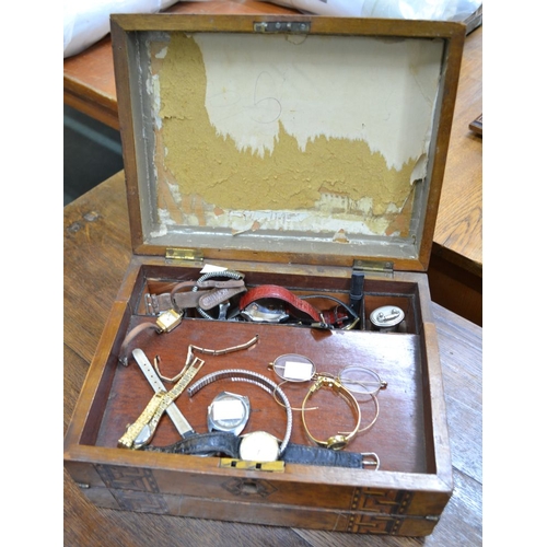 150 - A 19th century inlaid writing slope for restoration, containing a selection of pocket watches, wrist... 