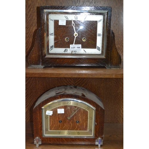 166 - Two wood cased mantel clocks