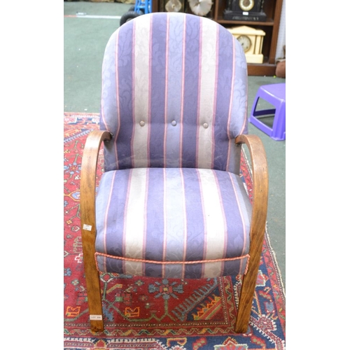 206 - An open armchair with steam bent arms upholstered in a stripe fabric