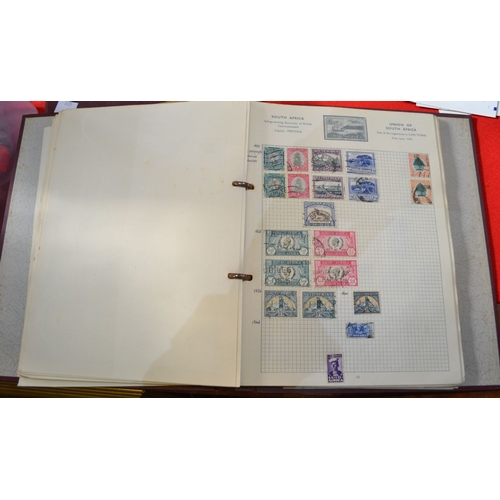 265 - Four small albums of mixed world stamps