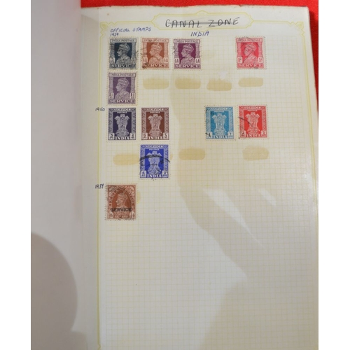 265 - Four small albums of mixed world stamps