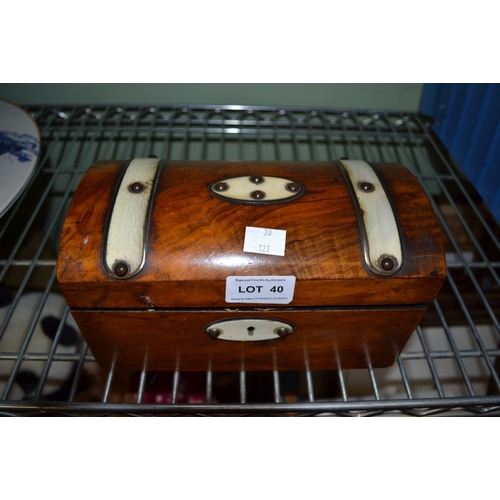 40 - A 19th century tea caddy in the form of a treasure chest containing three silver spoons and a silver... 