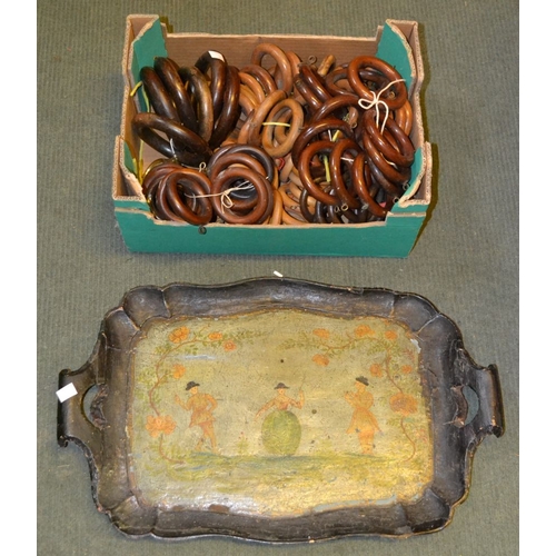 57 - Decorative painted tray with a selection of vintage wooden curtain pole rings