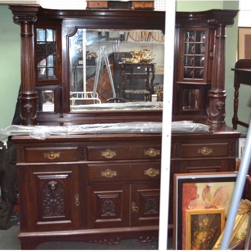 84 - A large mahogany mirror backed sideboard with twin columns