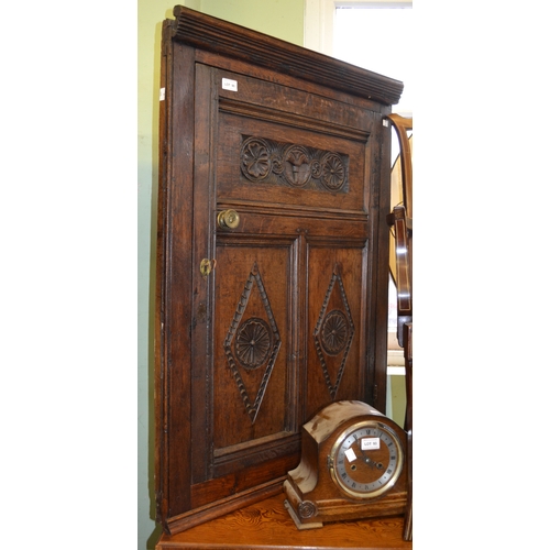 90 - An 18th century oak wall hanging corner cupboard, carved decoration, 100cm high