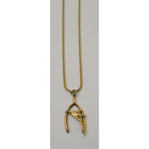 17 - A 9ct gold  rope twist necklace, 49cm long, 12.5g, together with a 9ct gold wishbone pendant, on a p... 