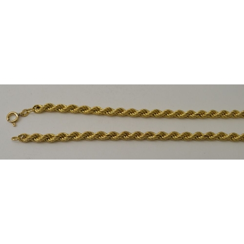 17 - A 9ct gold  rope twist necklace, 49cm long, 12.5g, together with a 9ct gold wishbone pendant, on a p... 