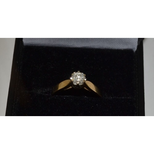 22 - A solitaire diamond ring, set on 9ct gold band, size K1/2