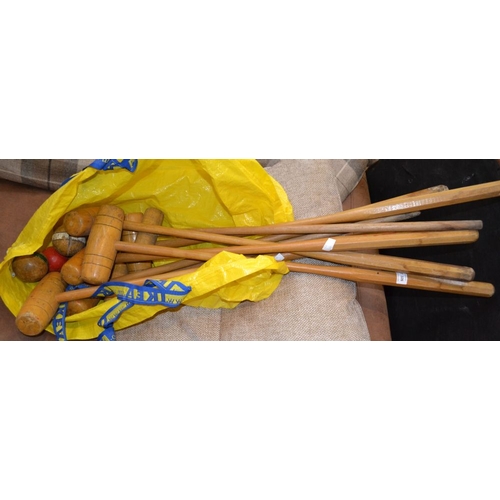 326 - Wooden croquet mallets and balls