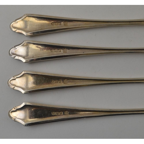 34 - Cooper Brothers & Sons Ltd. A set of four silver dessert forks, Sheffield 1966, together with a set ... 