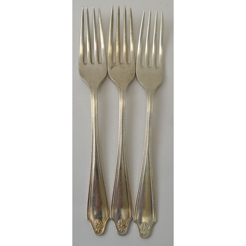 34 - Cooper Brothers & Sons Ltd. A set of four silver dessert forks, Sheffield 1966, together with a set ... 