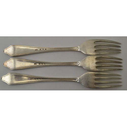 34 - Cooper Brothers & Sons Ltd. A set of four silver dessert forks, Sheffield 1966, together with a set ... 