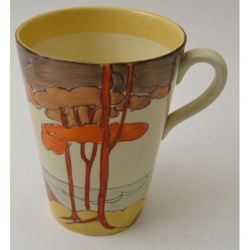 47 - A Clarice Cliff Coral Firs coffee mug of tapering form, hand painted pottery, bears factory back sta... 