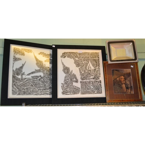 118 - Two Indonesian batik pictures and a portrait painted on a tobacco leaf - framed