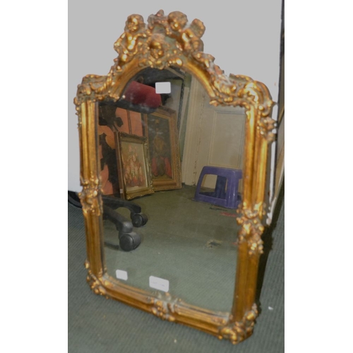 135 - A gilded wall mirror