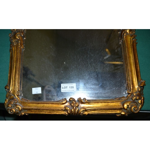 135 - A gilded wall mirror