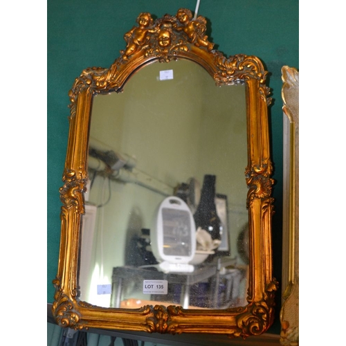 135 - A gilded wall mirror