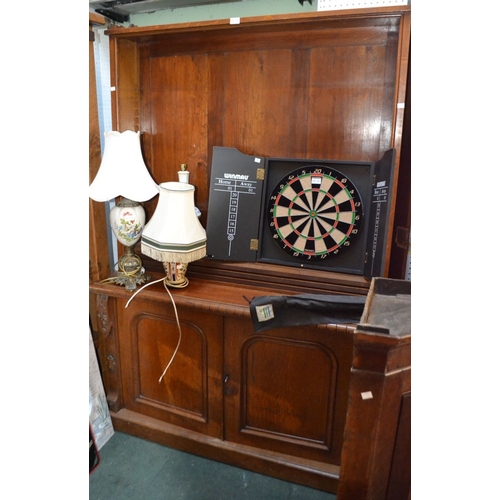 175 - An oak open bookcase on cupboard base