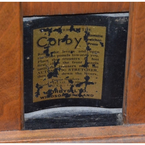 190 - An early example wooden framed Corby Trouser press