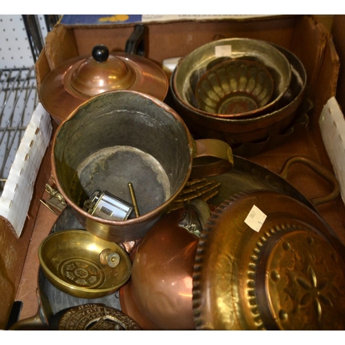 22 - A box containing a selection of brass and copper wares to include jelly moulds etc