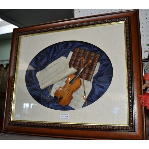 279 - A 3-d framed miniature violin with sheet music etc