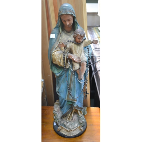 66 - A French ceramic figurines of The Madonna and child