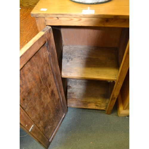 85 - A pine single door bedside cupboard