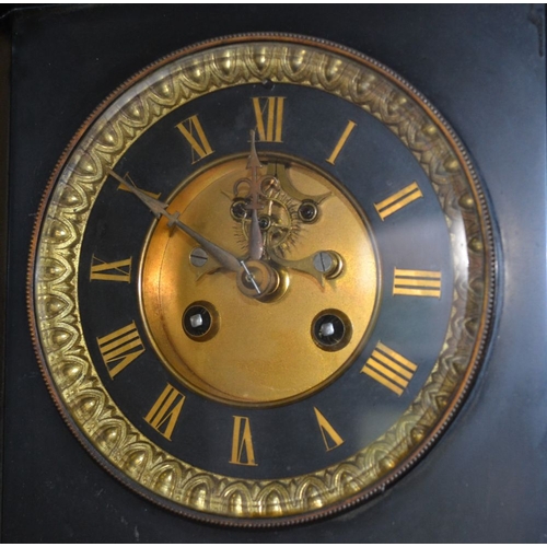 377 - A black slate mantel clock