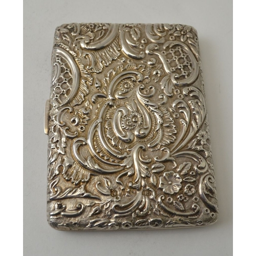 125 - George Unite, A late Victorian silver card case, embossed floral and lattice decoration, opens to re... 