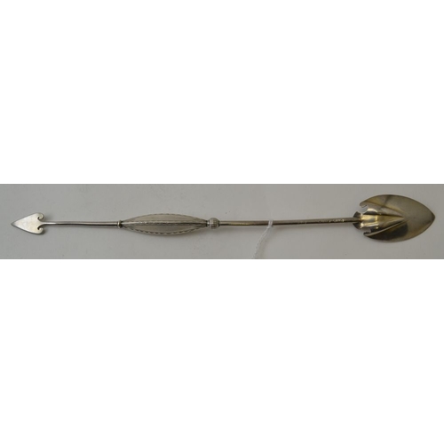 131 - A sterling silver Olive spoon, having spear end terminal, chased decoration 26.5cm long, 36g